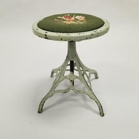 Antique cast iron swivel industrial stool with needlepoint seat- 17 1/4"H (at lowest) 14"W