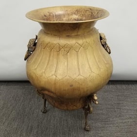 Large ornate brass footed planter with dragon & figural motif- 24 3/4"H 18"W (as seen- dents)