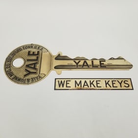 Vintage Yale 2-piece metal advertising sign: 12 1/4"H 32"L largest piece (as seen- lacking 1 hanging
