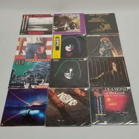 12 record albums some Japan press- KISS, Neil Diamond, Bruce Springsteen, REO Speedwagon, Steve