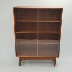 Poul Dinesen Danish teak cabinet/ bookcase with sliding glass doors- 55 1/4"H 40 1/2"W 13 3/8"D