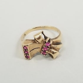 Vintage 10K gold bow motif ring set with pinkish red stones: 3.3 grams, ring size 7.5