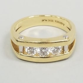 18K gold men's ring channel set with 3 diamonds; 91 tcw; 14.2 grams total; size 11 1/4
