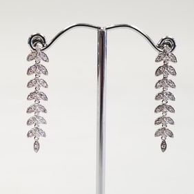 Pair 14K white gold drop earrings set with .50 tcw diamonds