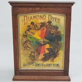 Diamond Dyes advertising oak cabinet "Evolution of Woman" with dye packages- 30"H 23"W 10"D