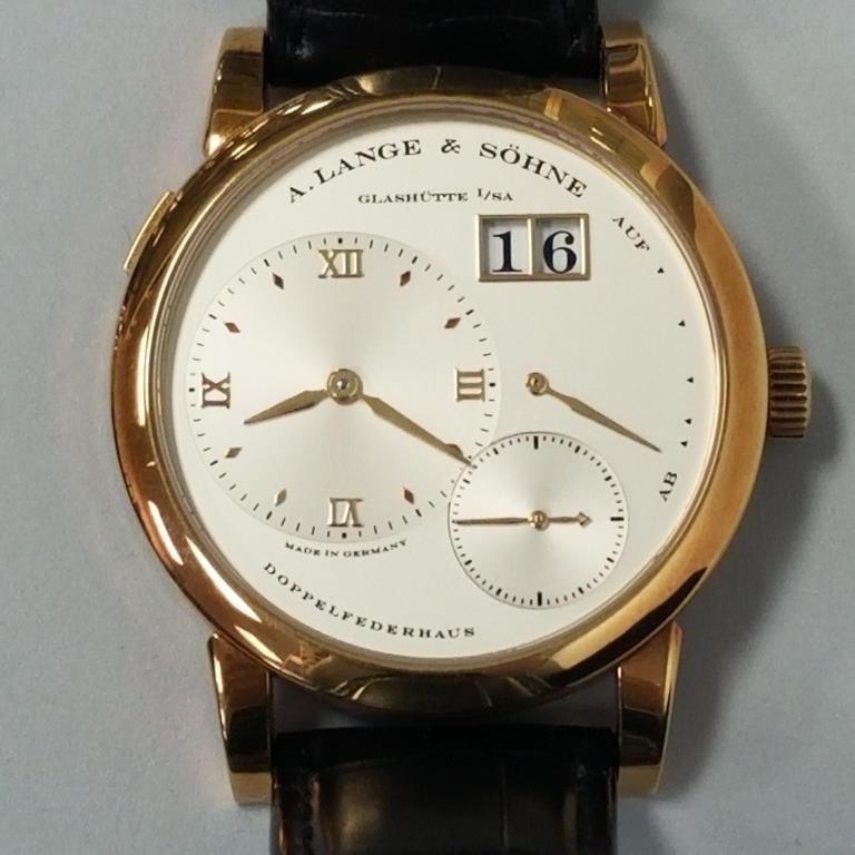 A. Lange & Sohne Glashutte SA Lange 1 - 18K yellow gold watch with leather band- model 147166 with: A. Lange & Sohne Glashutte SA Lange 1 - 18K yellow gold watch with leather band- model 147166 with box, booklet & hang tag
