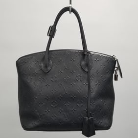 Louis Vuitton Lockit Revelation handbag- black leather with key & lock (shows light wear) 15"H 11"W