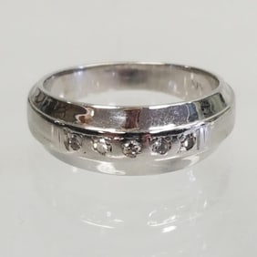 14K white gold band set with 5 diamonds; 5.6g- size 7