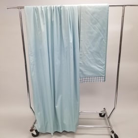 Pair blue cotton drapery panels with checkered border at top (some water staining and sun bleaching