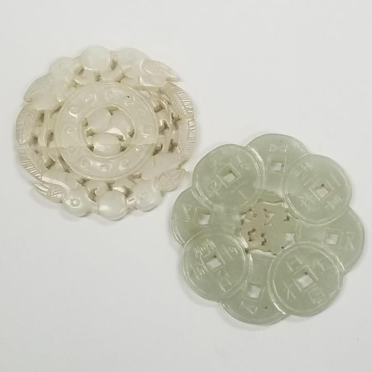 2 antique carved jade discs: 1 pierced coin motif & 1 bird motif- 2 1/4" diameter (1 with natural: 2 antique carved jade discs: 1 pierced coin motif & 1 bird motif- 2 1/4" diameter (1 with natural crack)
