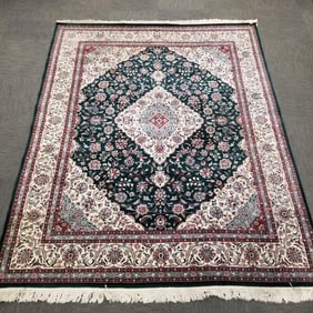 Handmade oriental pattern wool carpet with floral motif (1 corner edge as seen) 8' x 10'8"