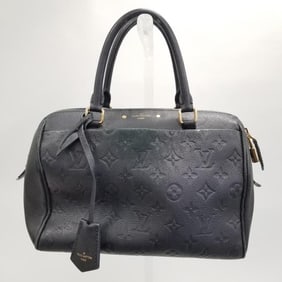 Louis Vuitton Speedy blue leather impressed monogram bag with lock & key (as seen- worn) 8" x 10"
