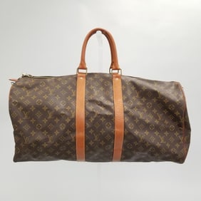 Vintage Louis Vuitton classic monogram canvas duffel bag (as seen- altered for strap, worn) 14" x 23