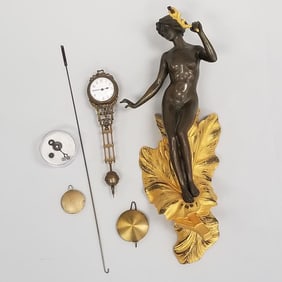 Bronze  figural nude free swinging wall clock- 17"H 7"W