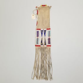 Sioux geometric pattern beaded pipe bag- 32"H 7"W including fringe with beadwork on both sides