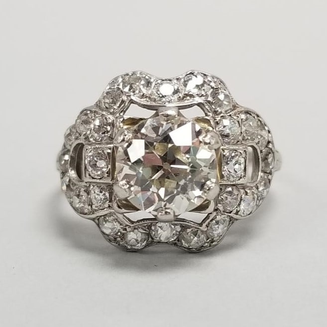 2.85 tcw natural diamond & platinum ring: center stone approx 1.65ct F-G/ VS-2 w/ 26 round side (1 of 13)