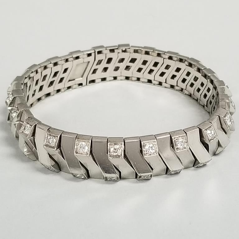 Platinum & approx 3.00 tcw natural diamond modern bracelet: 66.7 grams, 7 1/4"L w/ photocopy of (1 of 10)