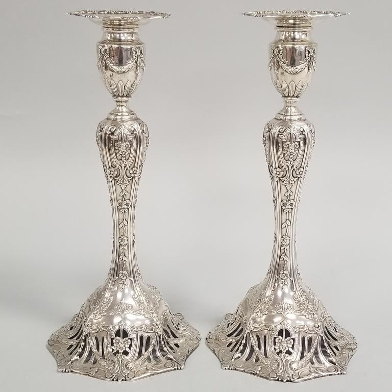 Pair ornate sterling silver weighted candlesticks- 32 toz total with pierced floral design- stamped (1 of 14)