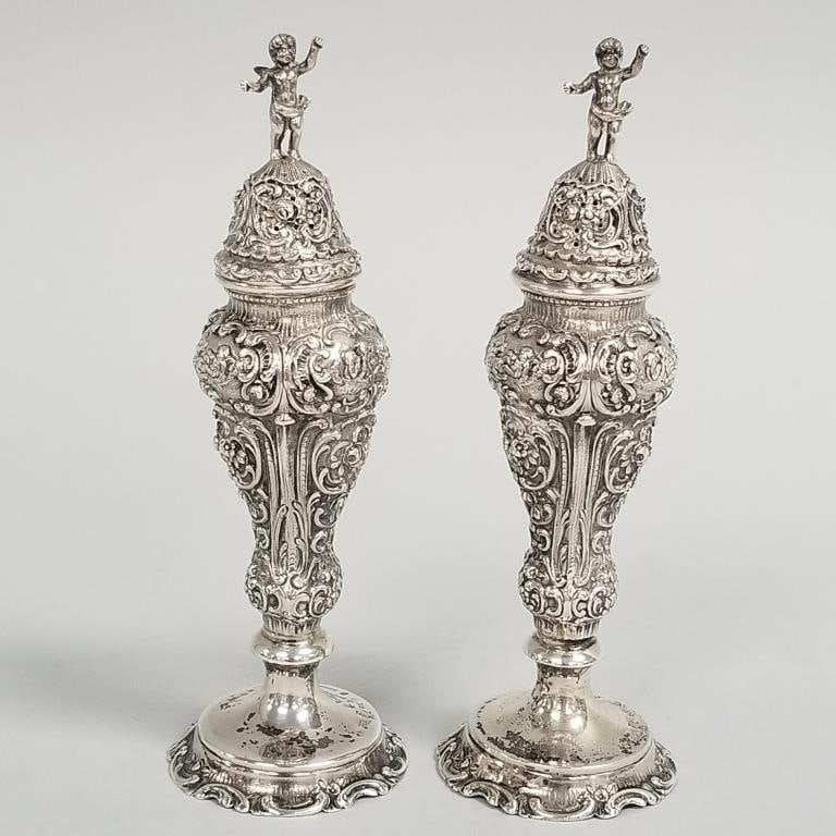 Pair ornate 800 silver shakers- 7 toz with winged cherub finials & floral Rococo motif- 6 3/8": Pair ornate 800 silver shakers- 7 toz with winged cherub finials & floral Rococo motif- 6 3/8" tallest