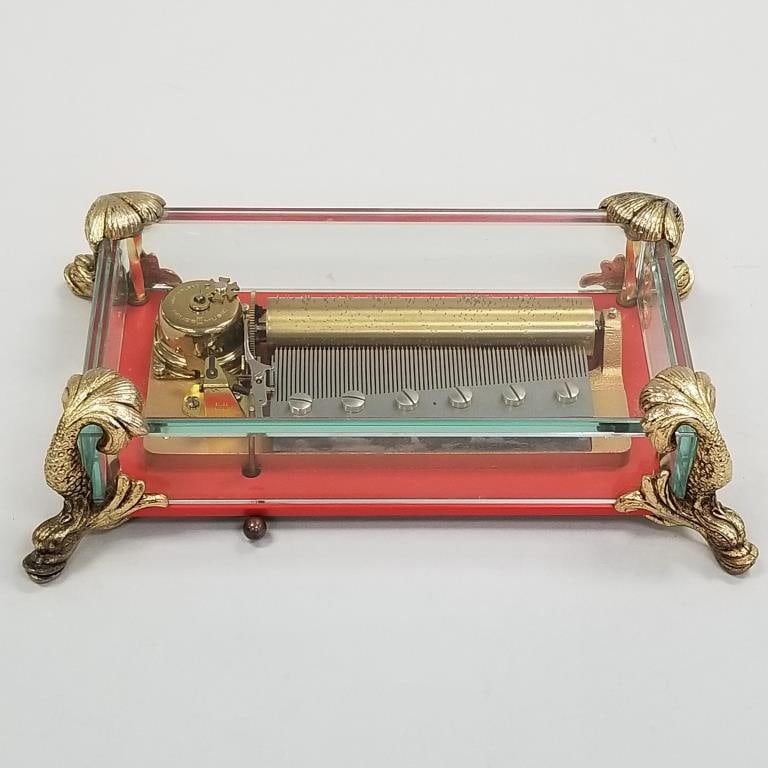 Reuge glass music box with dolphin feet- label on bottom Hungarian Rhapsody- 2 1/2"H 9 1/2"W 6"D: Reuge glass music box with dolphin feet- label on bottom Hungarian Rhapsody- 2 1/2"H 9 1/2"W 6"D (working)