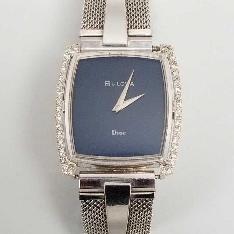 Bulova Dior 14K white gold case men's wristwatch with diamond accents & stainless steel band- 42.8 g: Bulova Dior 14K white gold case men's wristwatch with diamond accents & stainless steel band- 42.8 g total including movement & band- 25x29mm watch O.D. (currently running