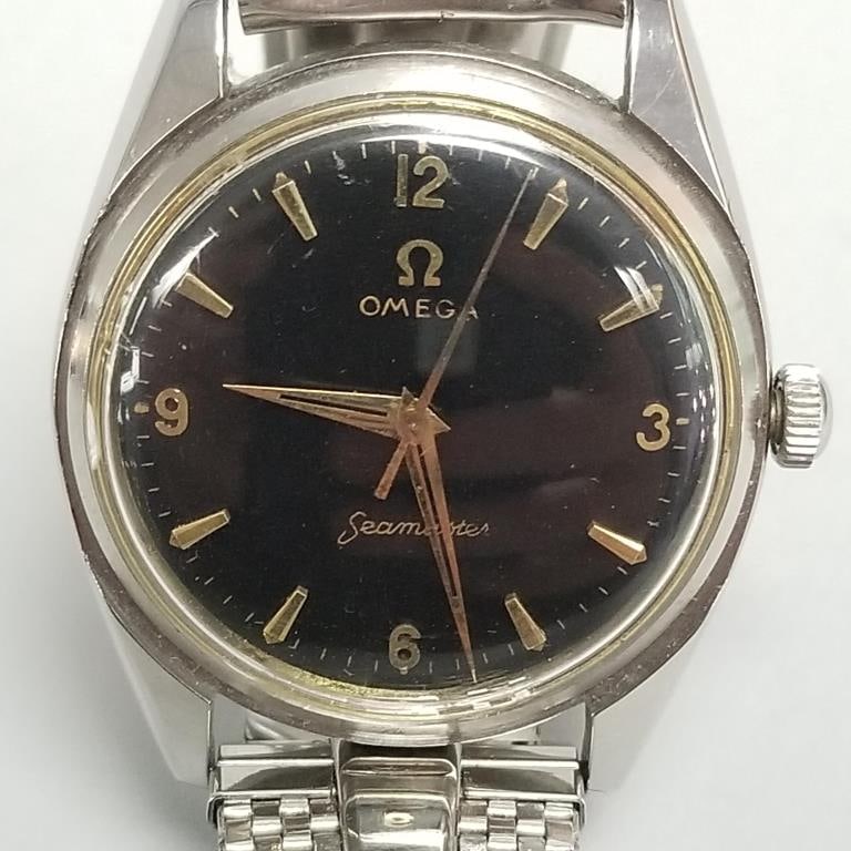 Vintage Omega Seamaster men's wristwatch with black dial, stainless case & band- 33mm (currently (1 of 9)