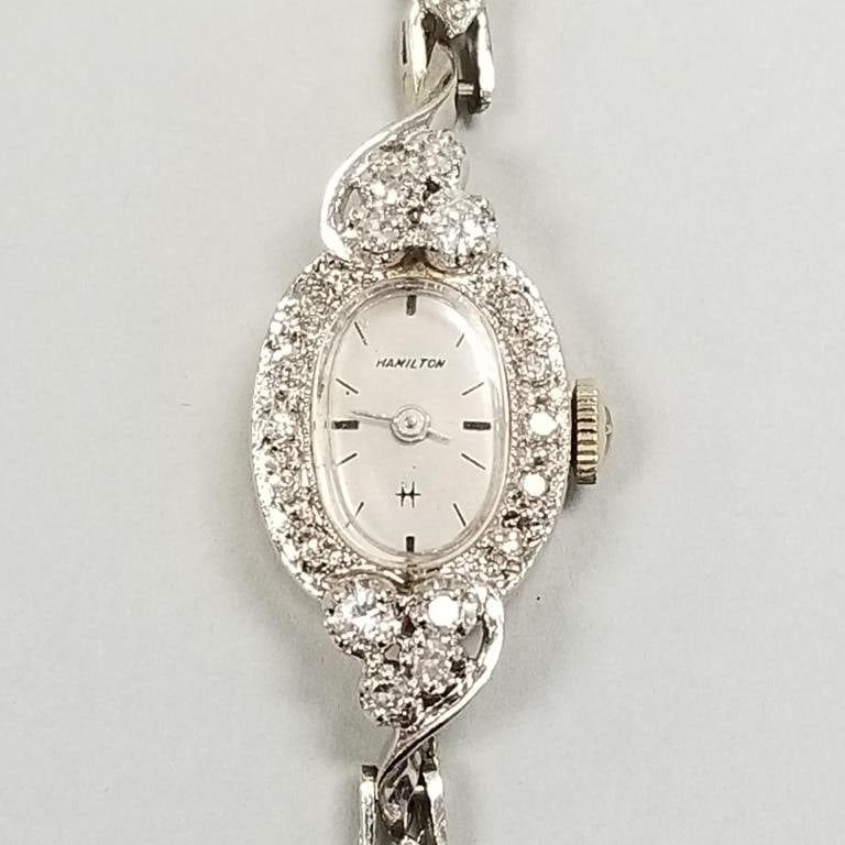 Vintage Hamilton 14K white gold case & band ladies wristwatch set with diamonds- 16.8g total: Vintage Hamilton 14K white gold case & band ladies wristwatch set with diamonds- 16.8g total including movement with box (currently running) 1 1/8"H 5 1/4"W 2 1/2"D box size