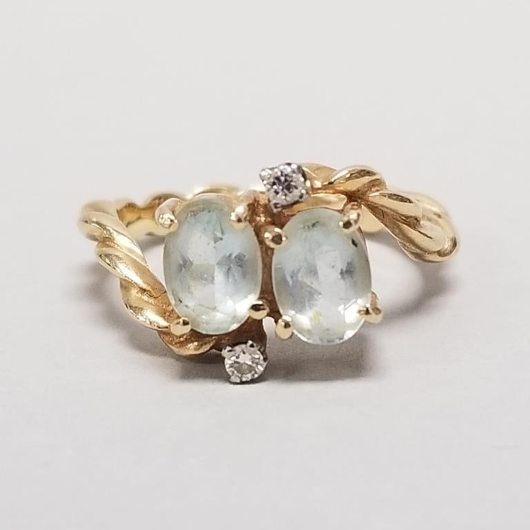 14K gold ring set with light blue stones & diamonds- 4.5g; size 7: 14K gold ring set with light blue stones & diamonds- 4.5g; size 7