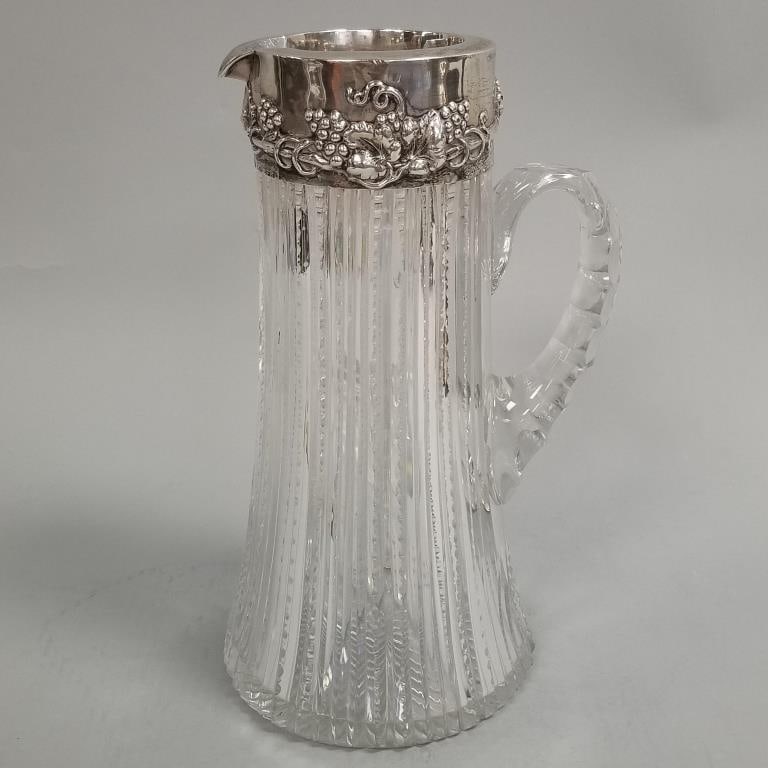 Sterling silver mounted cut glass pitcher- 11 3/4"H 7"W 6"D: Sterling silver mounted cut glass pitcher- 11 3/4"H 7"W 6"D