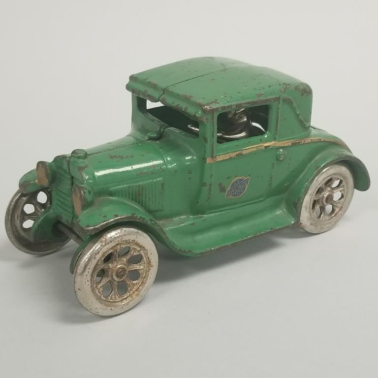 Arcade Model A cast iron car with driver & flip up seat- Freeport, Ill embossed underneath- 3 1/2"H (1 of 11)