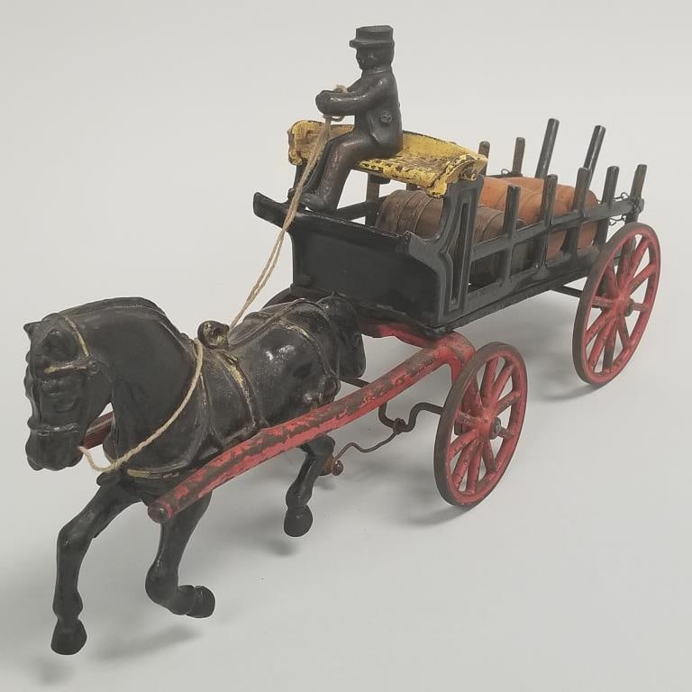 Hubley cast iron horse drawn dray wagon toy with driver & 3 wooden barrels- 7 1/2"H 15"L 4 3/4"W: Hubley cast iron horse drawn dray wagon toy with driver & 3 wooden barrels- 7 1/2"H 15"L 4 3/4"W