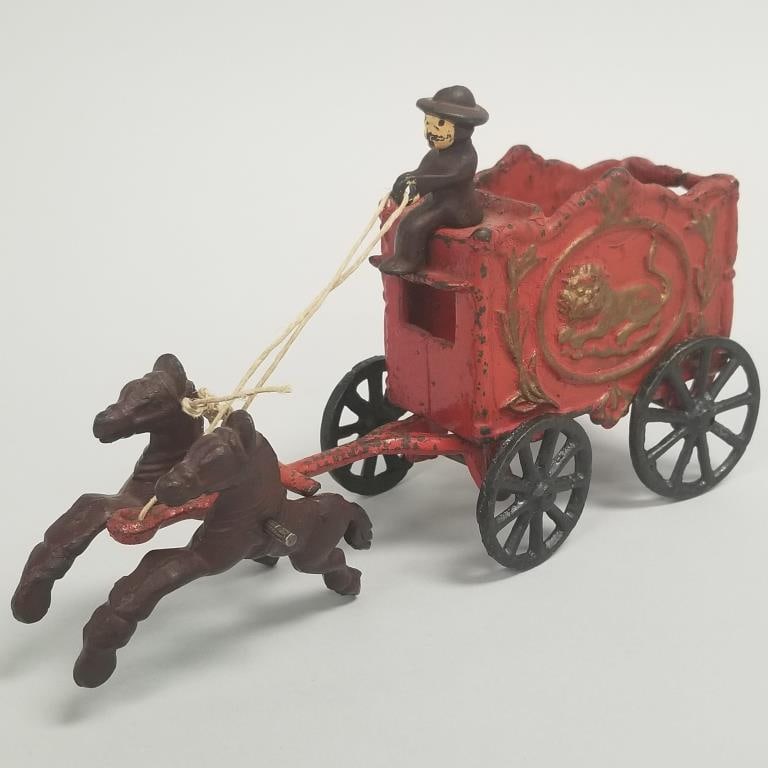 Cast iron horse drawn wagon w/ lion motif- 4 7/8"H 8 7/8"L 2 3/4"W: Cast iron horse drawn wagon w/ lion motif- 4 7/8"H 8 7/8"L 2 3/4"W