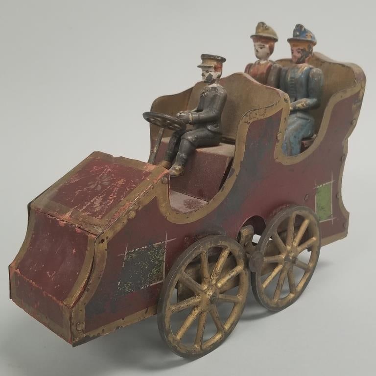 D.P. Clark "Hill Climber" horseless carriage friction toy w/ tin body & cast iron figures- 8"H 10: D.P. Clark "Hill Climber" horseless carriage friction toy w/ tin body & cast iron figures- 8"H 10 1/2"L 4"D