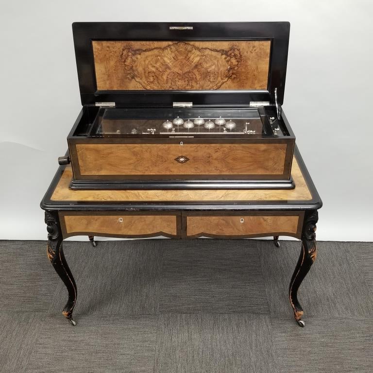 Antique G. Baker & Co. Geneva cylinder music box with bells on original table with drawers & 4: Antique G. Baker & Co. Geneva cylinder music box with bells on original table with drawers & 4 interchangeable 16" cylinders- 31"H 50"W 28"D, original framed receipt, music list & instructions- curren