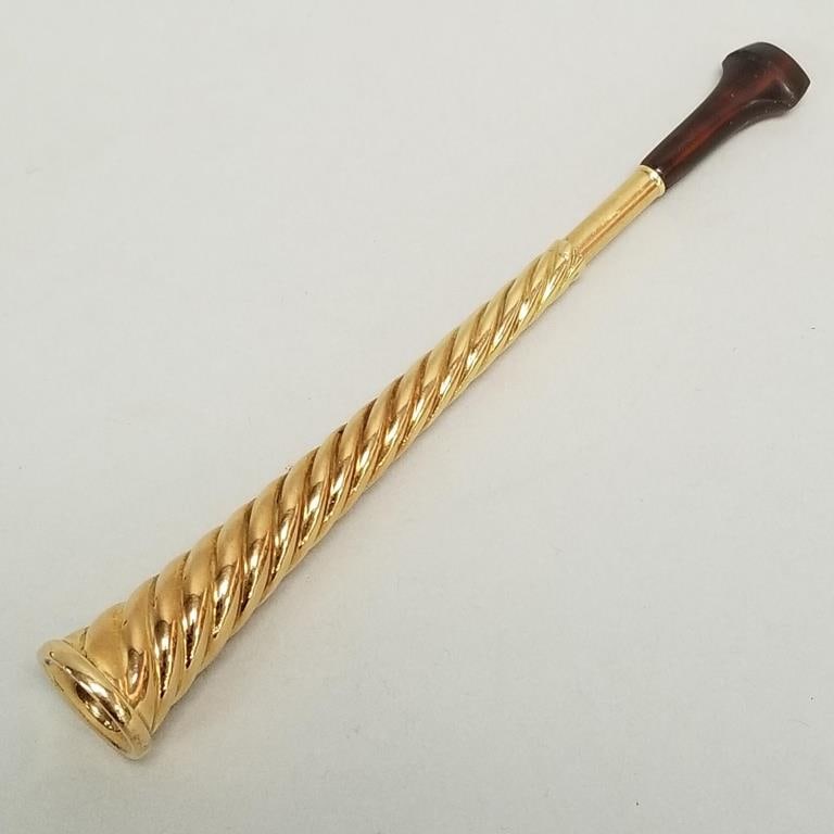 Cartier 18K gold ejector cigarette holder- 11.6g total including mouthpiece in fitted Cartier: Cartier 18K gold ejector cigarette holder- 11.6g total including mouthpiece in fitted Cartier leather case (some wear) 1 1/4"H 5 3/8"L 1 3/4"D