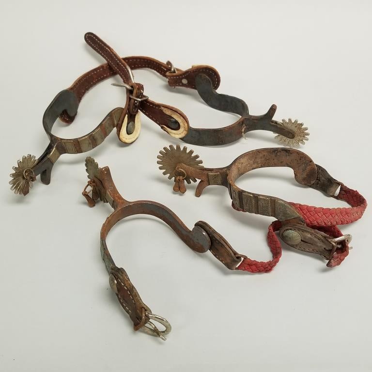 2 pair spurs with silver tone metal decoration, dangles and straps- 7"L 4 1/2"W largest (1 of 15)