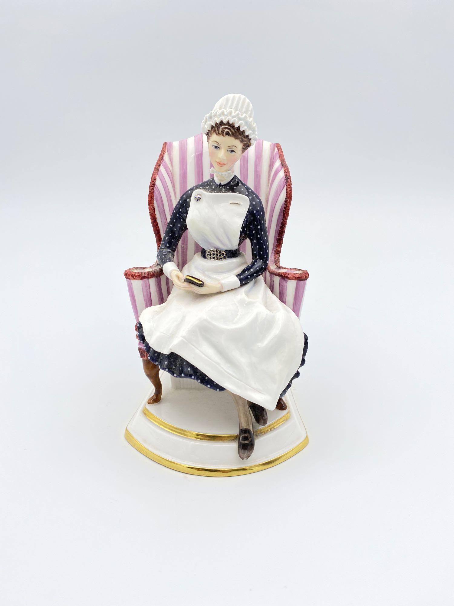 Royal Worchester 1963 "Nursing Sister" Porcelain Figure: A MODEL OF A SISTER, NIGHTINGALE TRAINING SCHOOL, ST. THOMAS' HOSPITAL (LONDON) FROM A SERIES OF NURSING SISTERS 1963, MODELLED BY RUTH VAN RUYCKEVELT, 7"