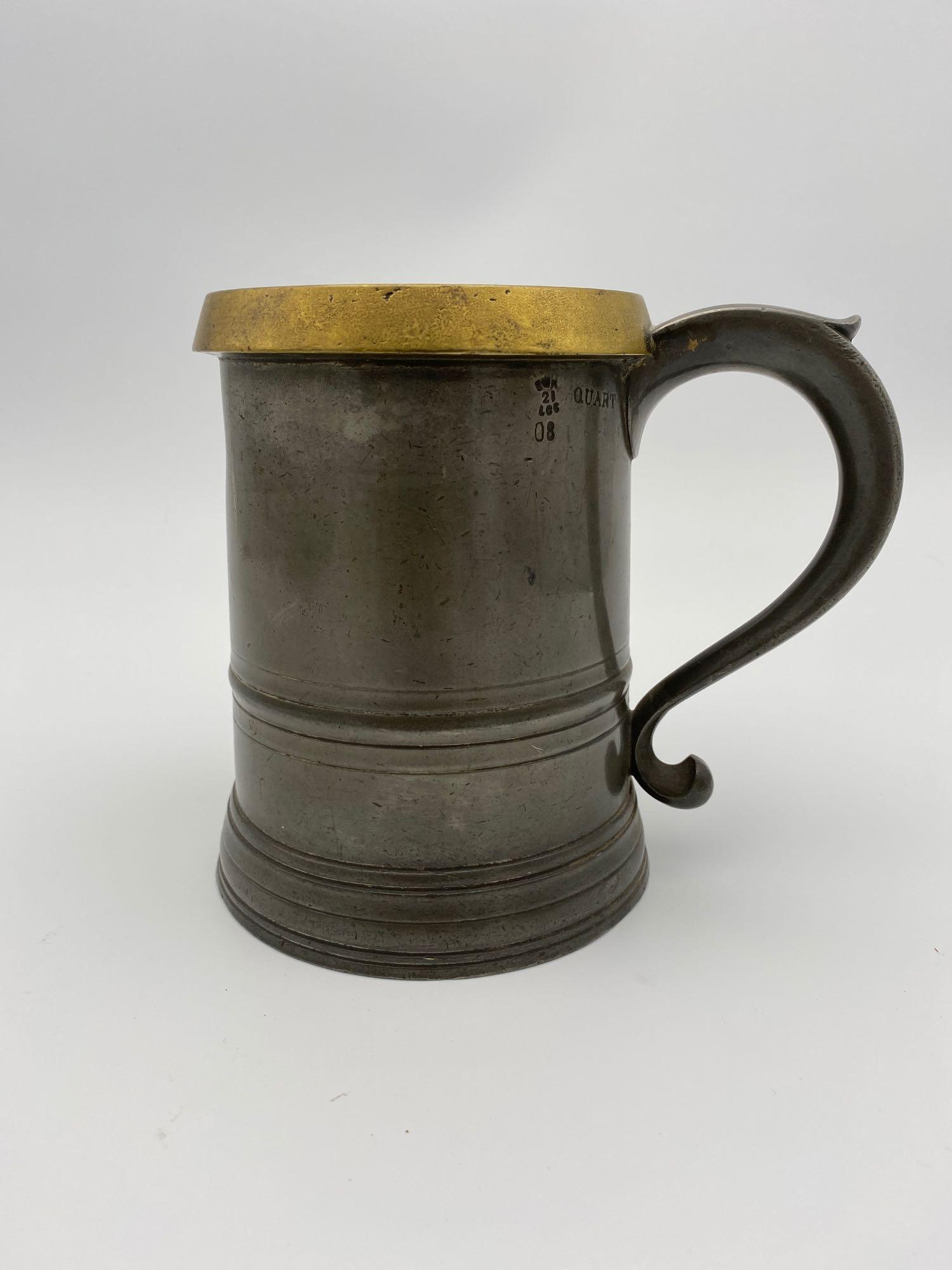 Brown & Englefield London Pewter 1 Qt Measure w/ Brass: Very nice Brown and Englefield of London 1 Quart measure with brass rim. Dates to 1901-1910 with Edwardian verification mark (ER). Also has varied signatures and inscriptions on bottom. Compliments Lo