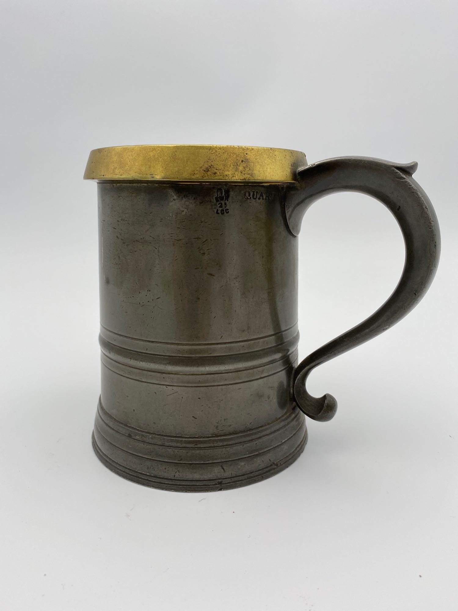 Brown & Englefield London Pewter 1 Qt Measure w/ Brass: Very nice Brown and Englefield of London 1 Quart measure with brass rim. Dates to 1901-1910 with Edwardian verification mark (ER). Also has varied carved pattern and inscriptions on bottom. Compliment