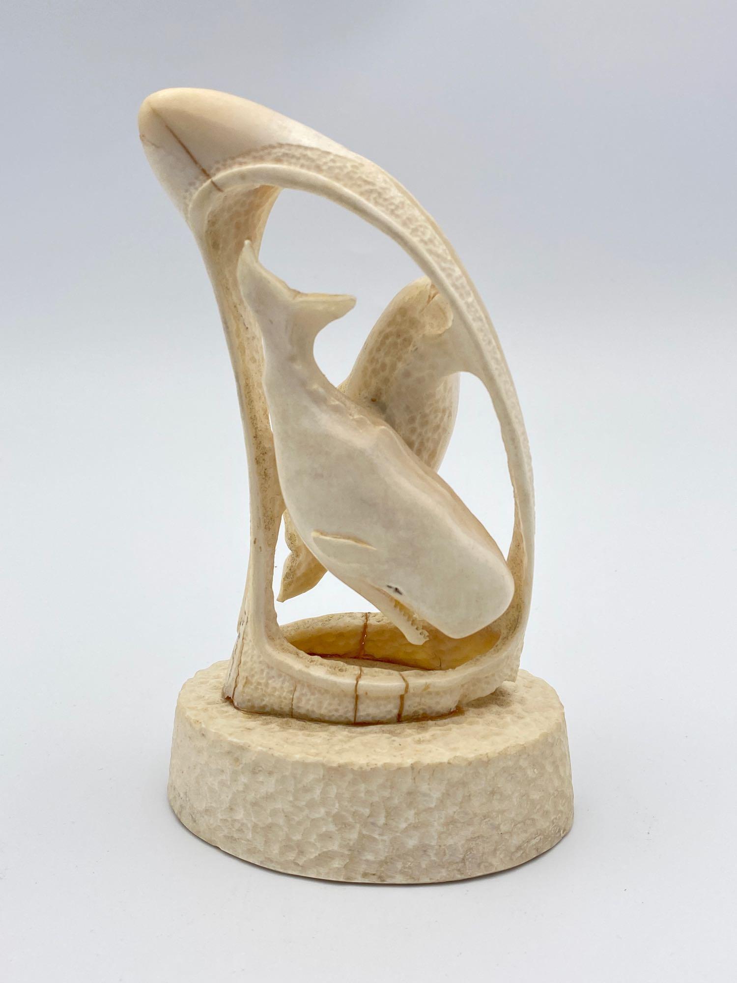 K.D. Sprague Signed Scrimshaw Bone Whale: Carved bone with whales signed by K.D. Sprague measuring 6"