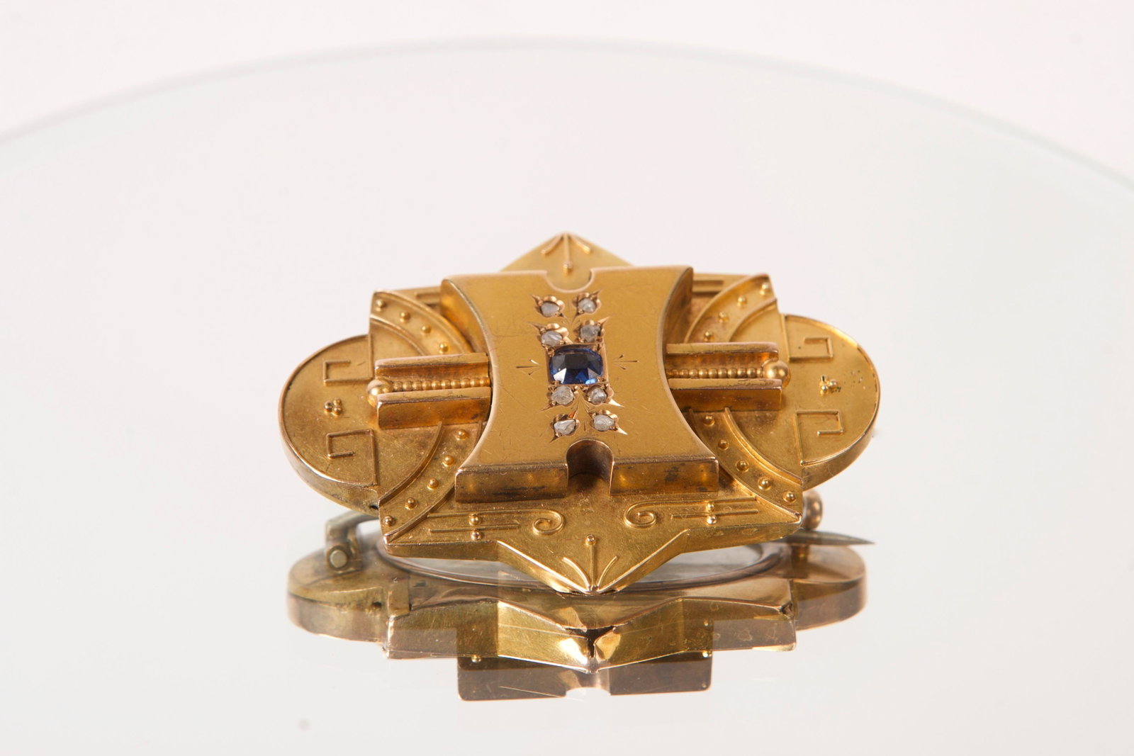 Circa 1870 9K Gold Memorial Brooch Locket: Circa 1870 9K Gold Memorial Brooch & Locket set with 1 Cushion cut Blue Sapphire and Eight Rose Cut Diamonds, Total Stone Weight = 0.43ct estimated Weight 11.0g, Professional repair on the Back, Two m
