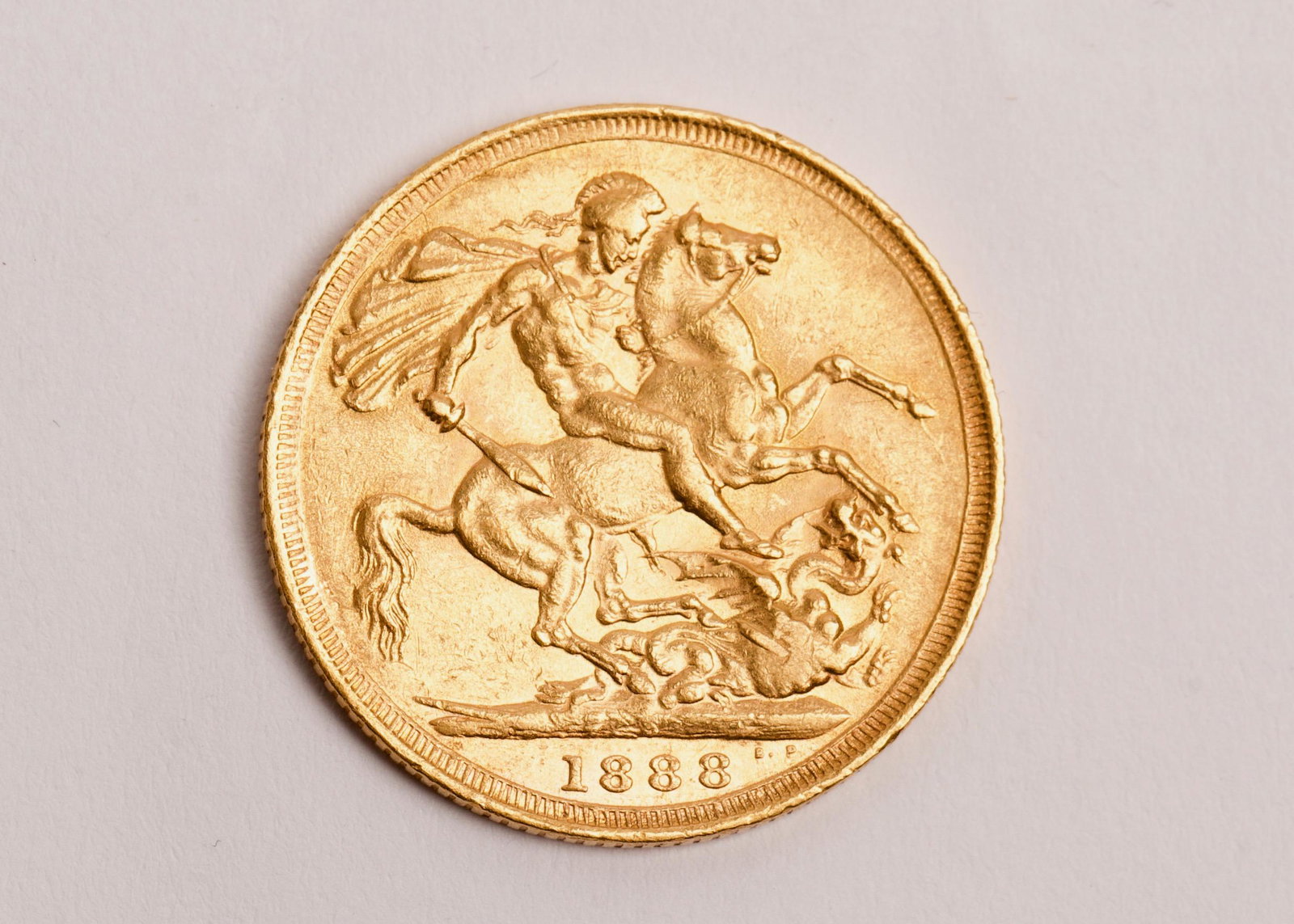 1888 St. George & Dragon 22K Gold Sovereign: 1888 St. George & Dragon 22K Gold Sovereign, Minted in London Weight 7.98g, Gold Purity 7.31g, Grade Fine