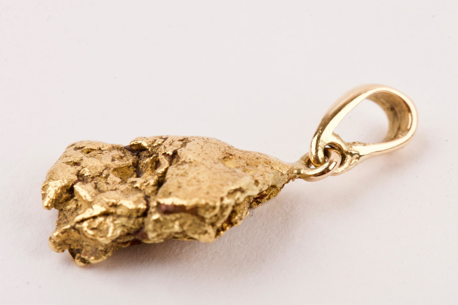 Australian 24K Gold Nugget on a 18K Pendant: Australian 24K Gold Nugget on a 18K Pendant Total Weight 4.2g, 24ct Gold Nugget in 18ct Pendant