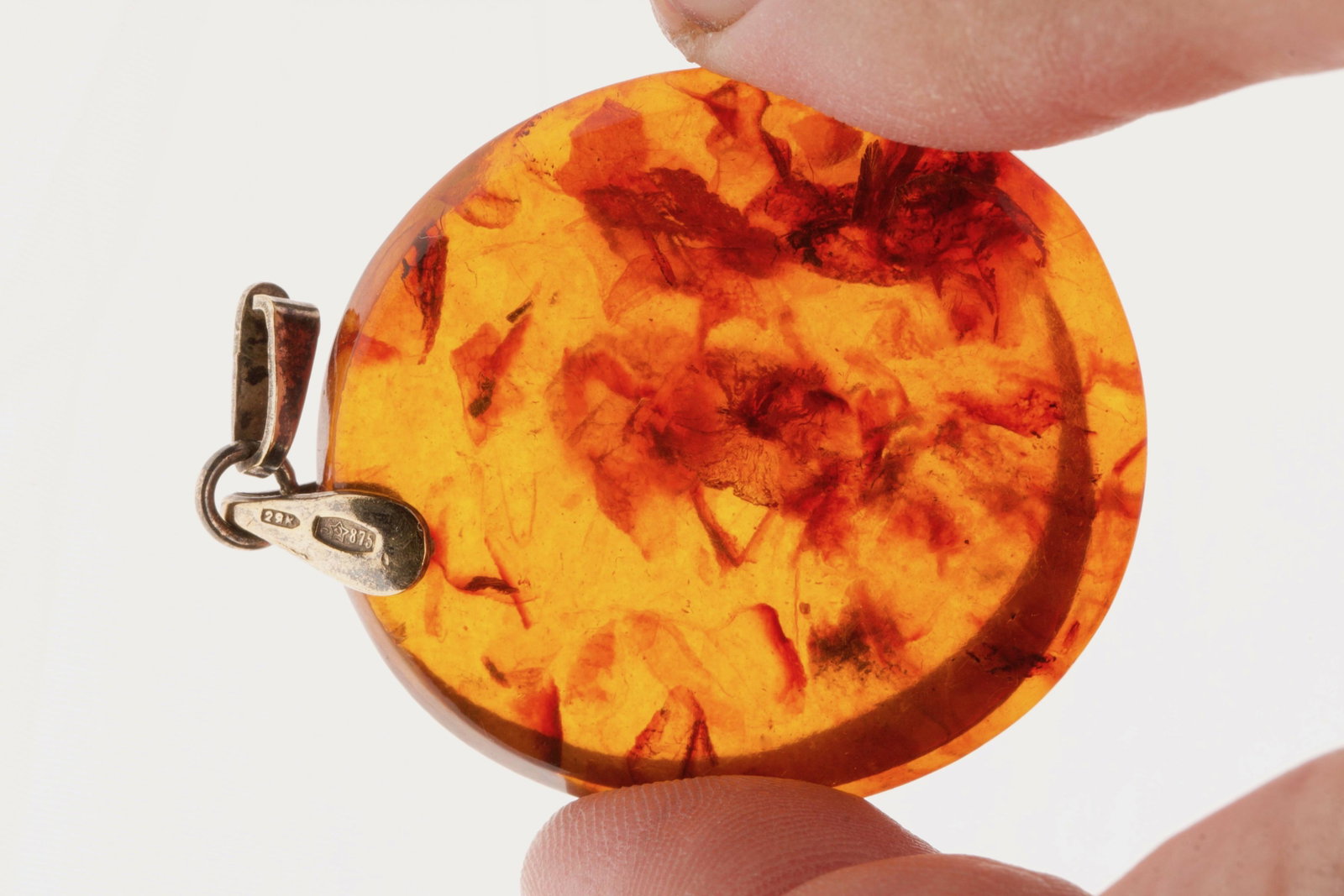 Russian Amber & 21K Gold Pendant with Makers Stamp: 21K Yellow Gold Oval Disc Shaped Amber Pendant Stamped with Russian Hammer & Sickle 875 Weight 13g, Size 40 x 50mm Makers mark "2ЯK" from Kaliningrad Amber Combine