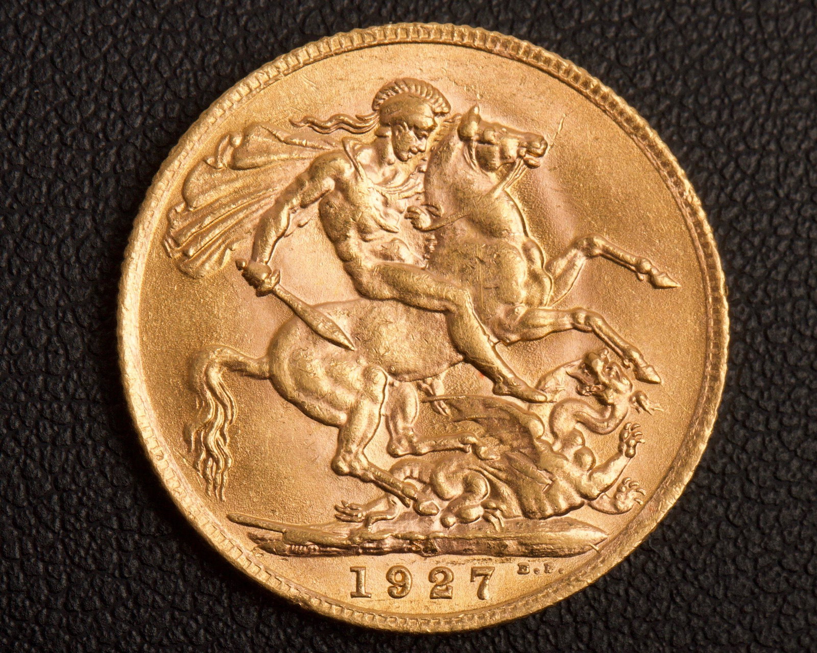1927 St. George & Dragon 22K Gold Sovereign, Pretoria: 1927 St. George & Dragon 22K Gold Sovereign, Pretoria Mint, South Africa Weight 7.98g, Gold Purity 7.31g, Grade Very Fine