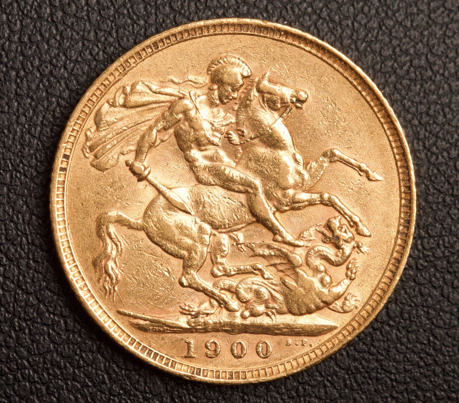 1900 St. George & Dragon 22K Gold Sovereign: 1900 St. George & Dragon 22K Gold Sovereign, Minted In London Weight 7.98g, Gold Purity 7.31g, Grade Fine