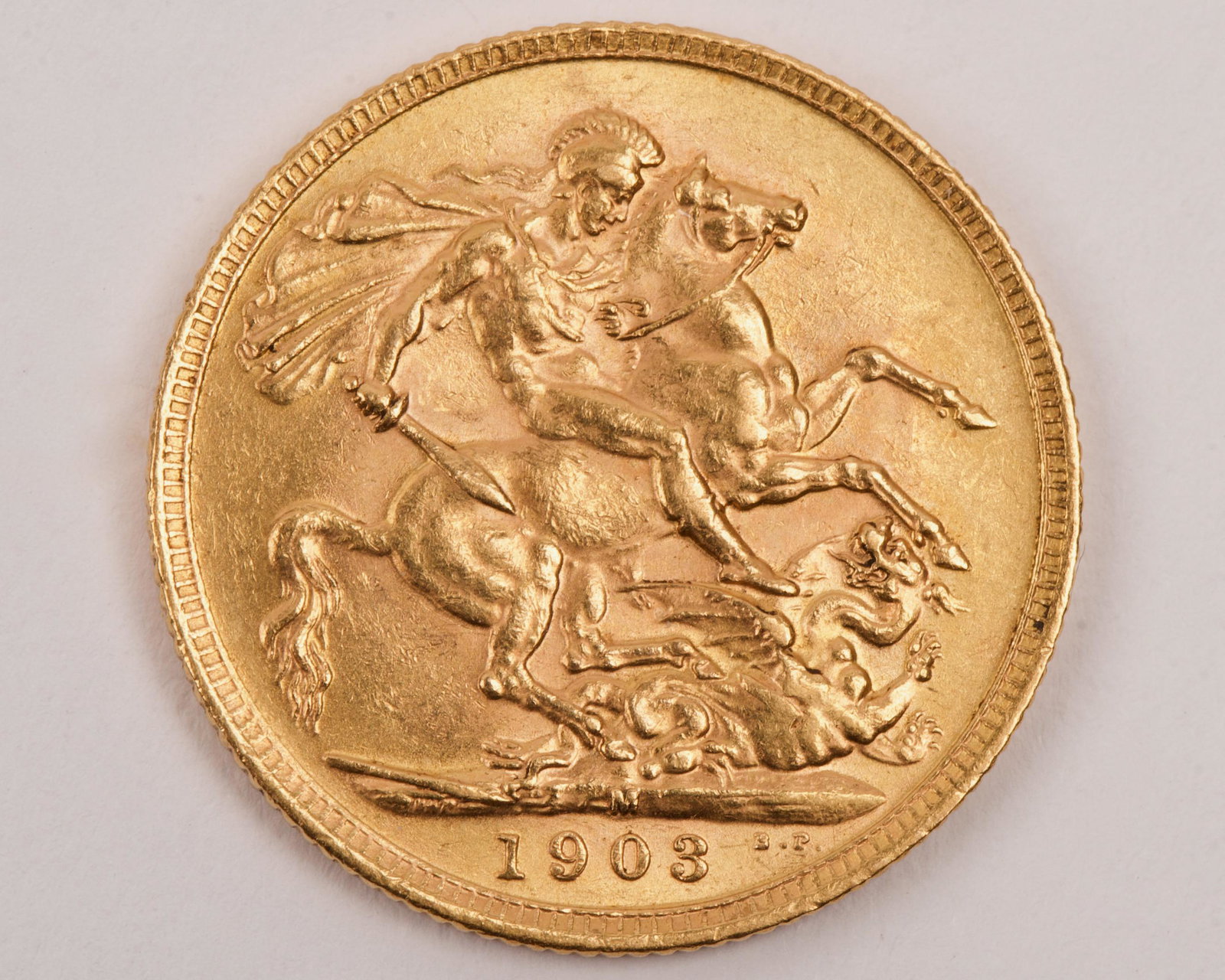 1903 St. George & Dragon 22K Gold Sovereign: 1903 St. George & Dragon 22K Gold Sovereign, Minted in Melbourne Weight 7.98g, Gold Purity 7.31g, Grade Very Fine