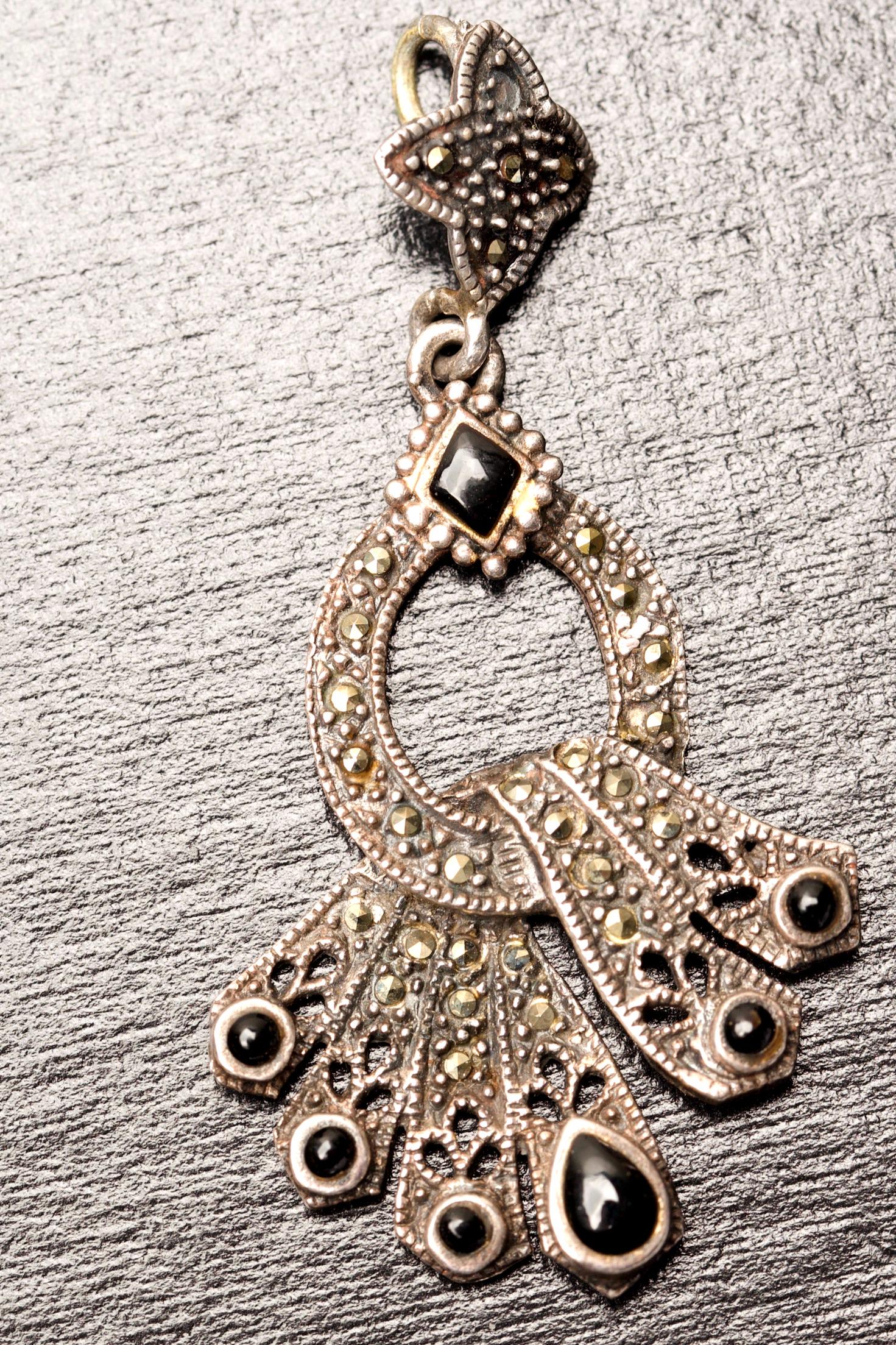Three (3) Sterling Silver Pendants: Marcasite Pendant, Pearl Pendant and Bird Motif Pendant Three (3) Pendants in Total Quantity: 1 Condition: Good Materials: Marcasite Item location: NSW, Australia Shipping: In-house