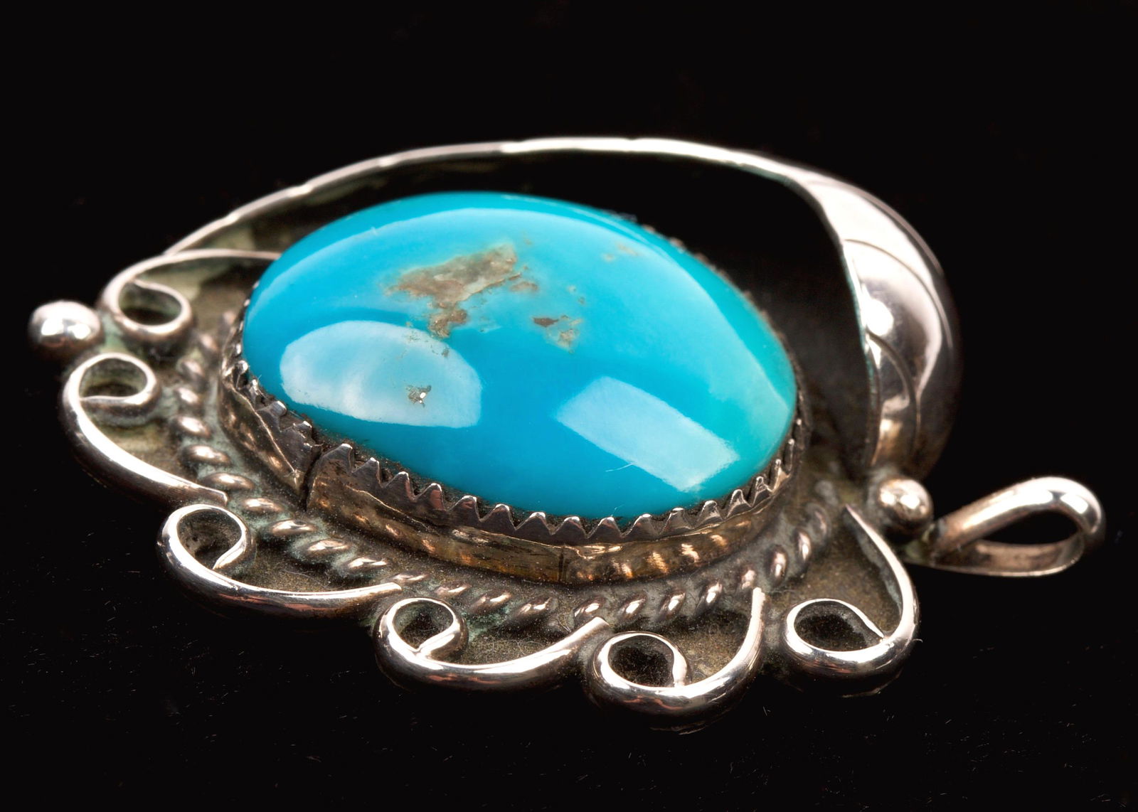 Navajo Turquoise & Sterling Silver Pendant: Navajo Turquoise and Sterling Silver Pendant Weight 10.2g Quantity: 1 Condition: Good Weight: 10.2g or approximately 0.36oz Origin: American > North American > Native American