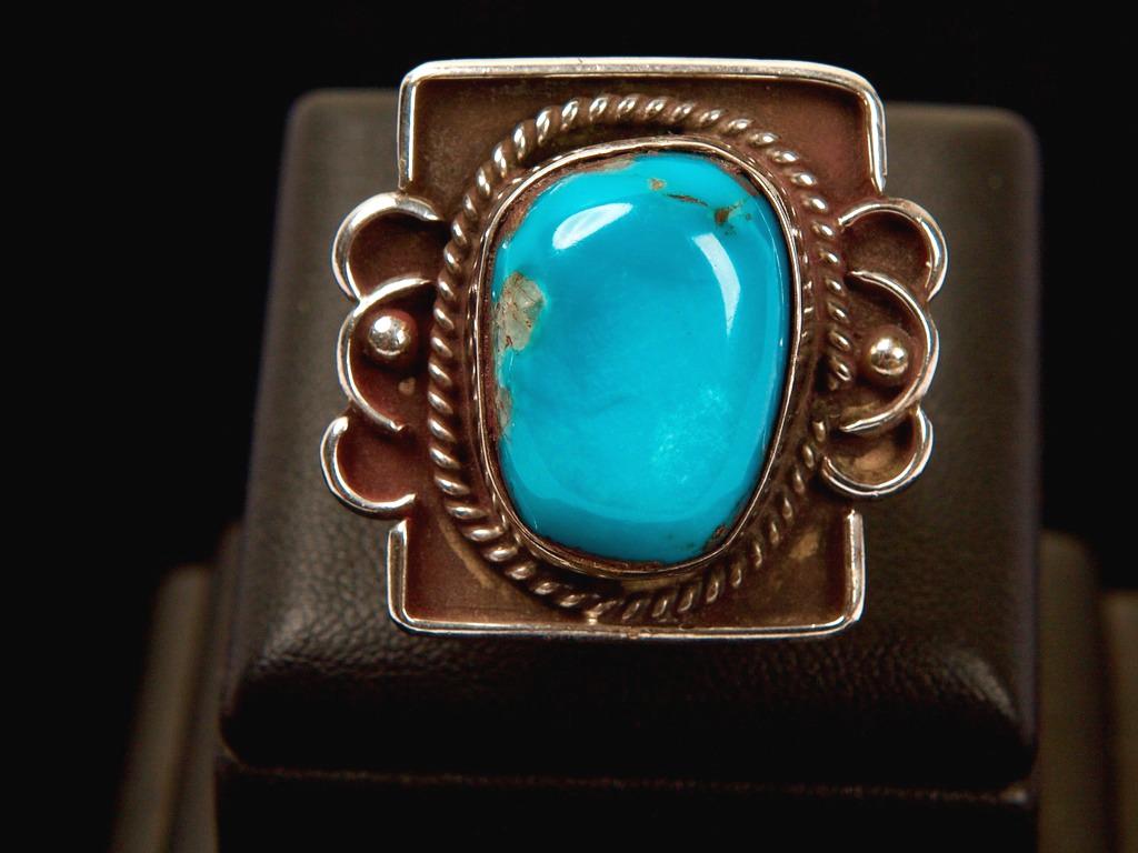 Navajo Sterling Silver and Turquoise Ring: Quantity: 1 Condition: Good Weight: 12.6g or approximately 0.44oz Ring Sizing: 6 (US & Canada) M (UK & Australia 52 3/4 (France & Russia) 12 (Japan) 16 1/2 (Germany) 12 3/4 (Swiss) Inside